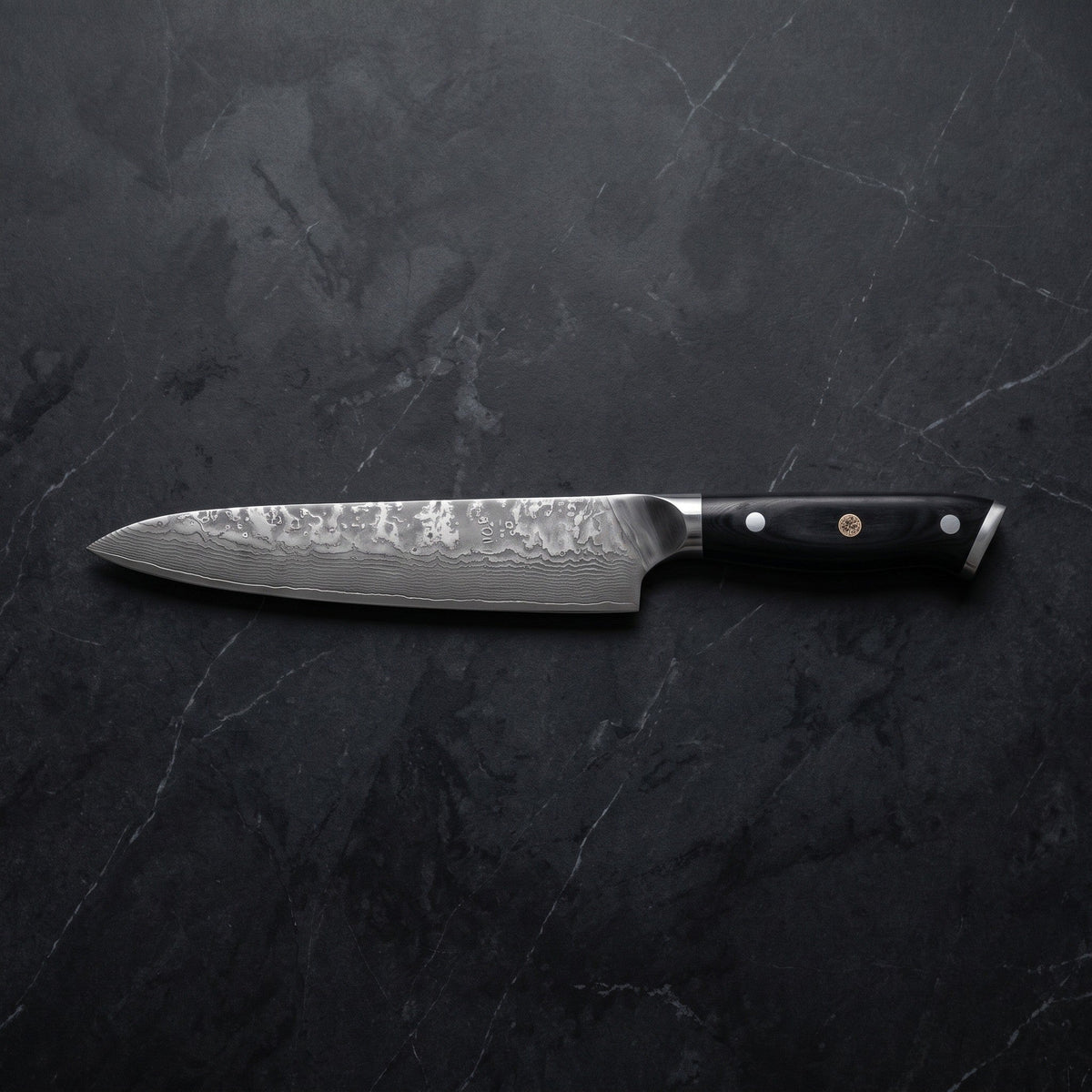 Genbu Gyuto Chef Knife – on the board